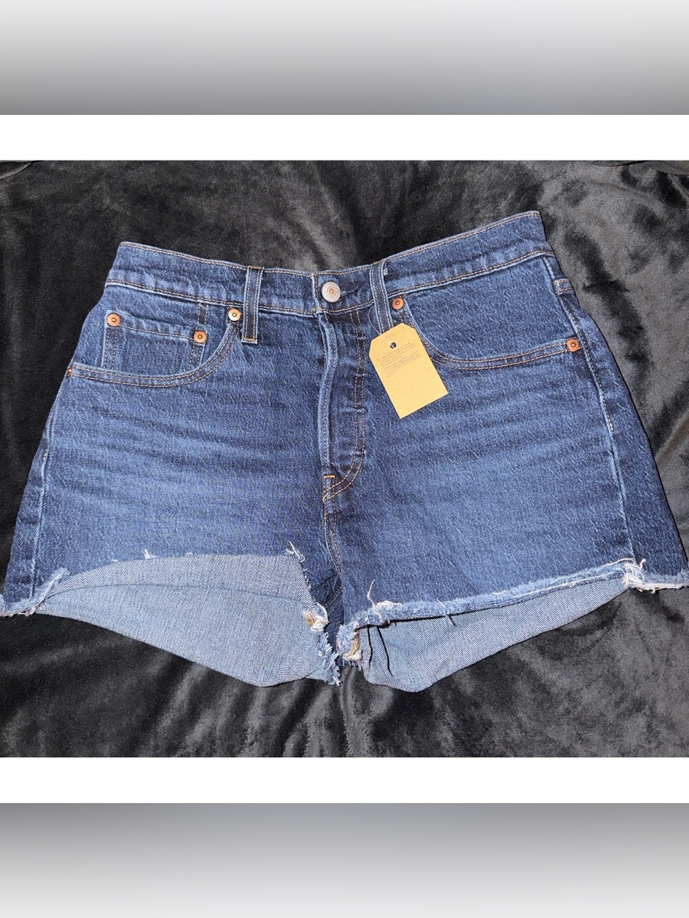 Levi's High-Rise Dark Blue Denim Cutoff Shorts with Raw Hem